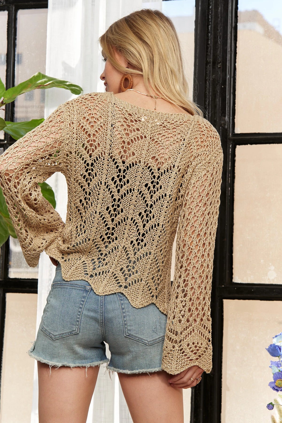 Trendsi ADORA long sleeves crochet top with round neckline, featuring intricate crochet pattern and fitted design.