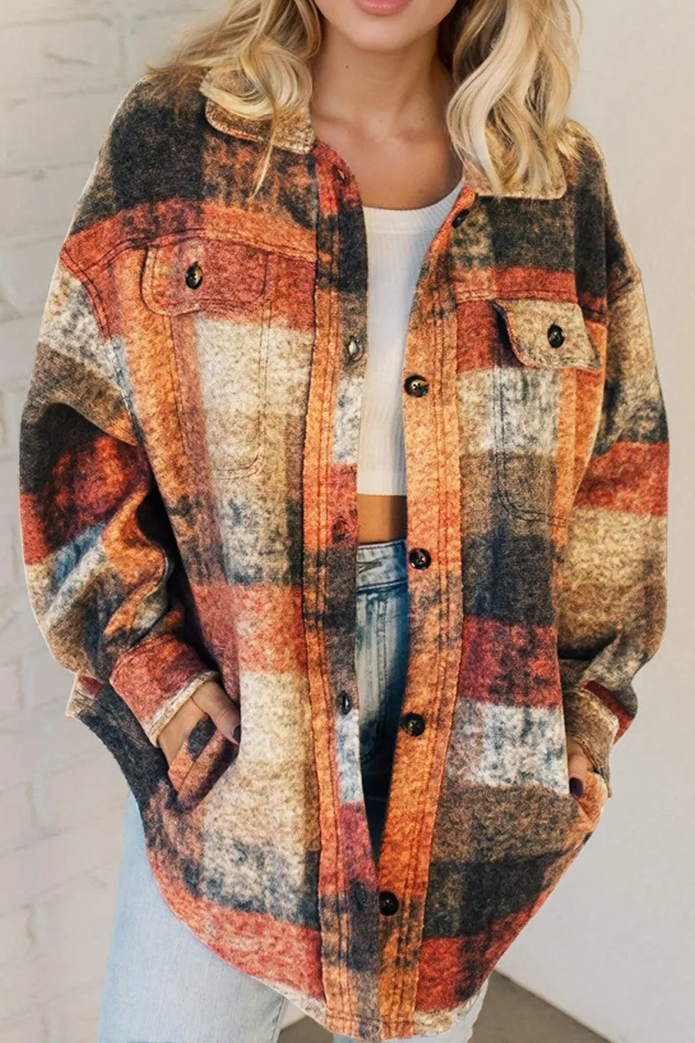 Trendsi Double Take plaid fleece shacket with button-up front and front pockets, featuring a cozy, stylish plaid design.