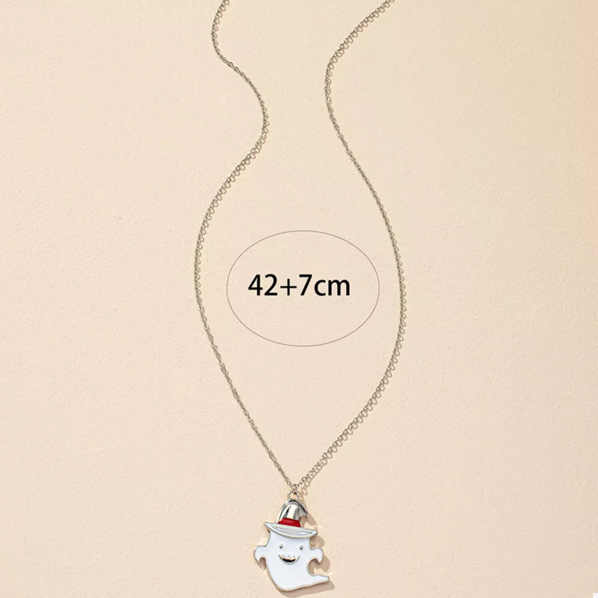 Cute ghost pendant necklace from Trendsi featuring a Halloween-themed ghost charm on a silver chain.