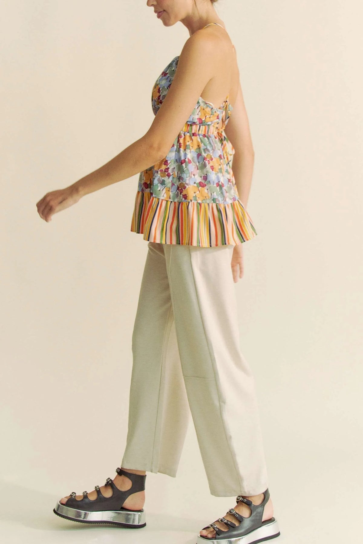 Sage floral smocked sleeveless top by Davi & Dani with ruffle details and back tie, perfect for warm weather fashion.