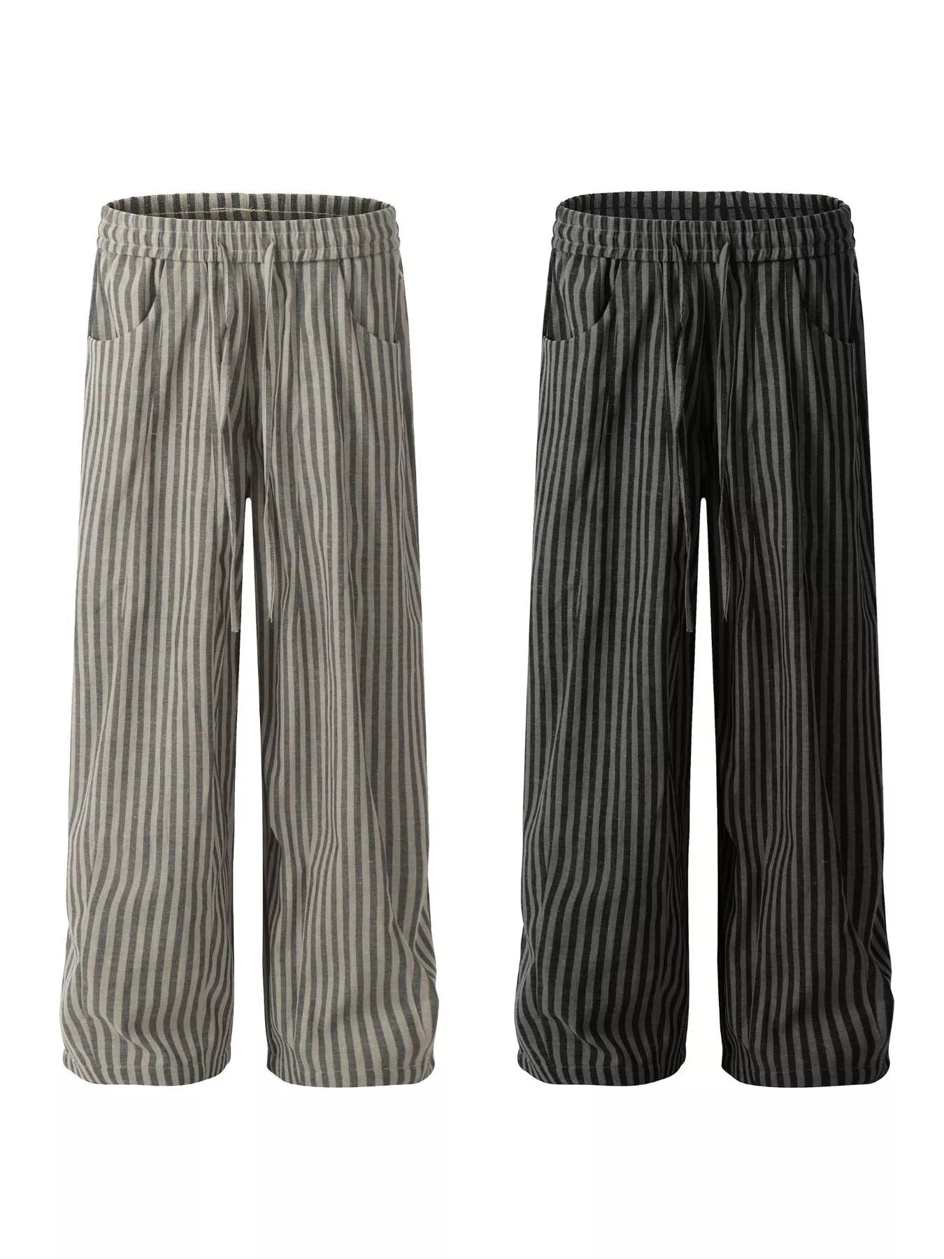 Men's black striped casual drawstring pants from Trendsi, featuring a relaxed fit and comfortable waistband.
