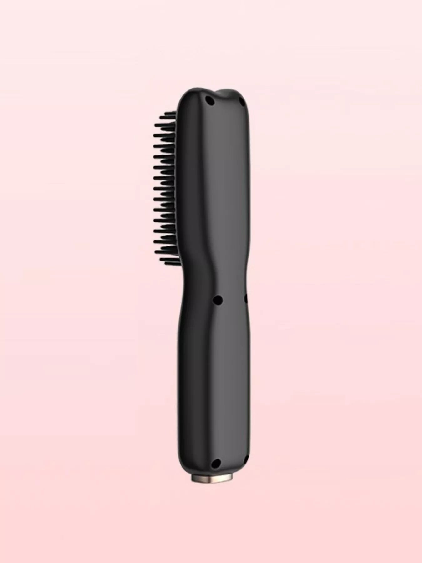 Blush pink portable heated hair straightening comb by Trendsi showing its compact design and heated teeth for quick styling.
