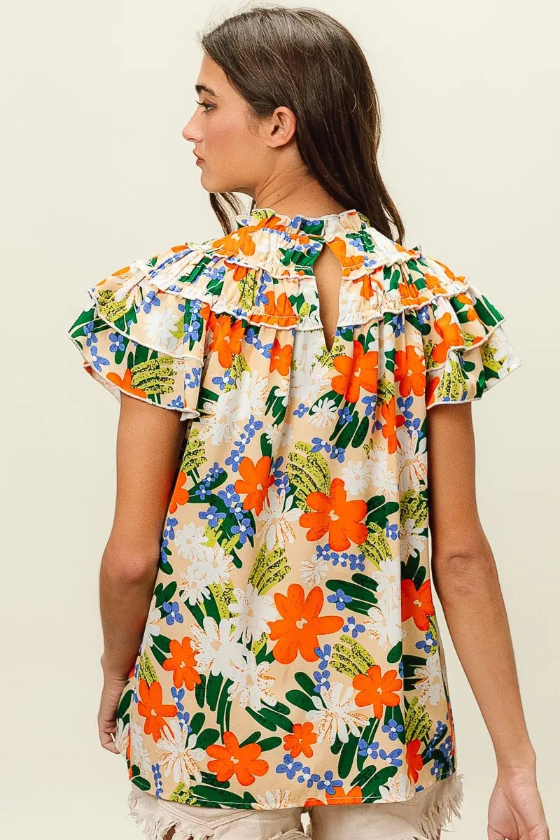 Multi-color floral print woven top by Trendsi, featuring a cream background and stylish design, perfect for casual wear.