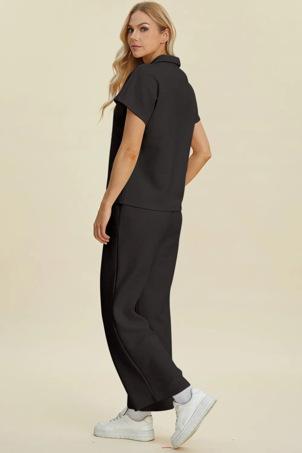 Cream-colored Trendsi Double Take full-size short sleeve top and pants set with a collared neckline, stylish and comfortable.