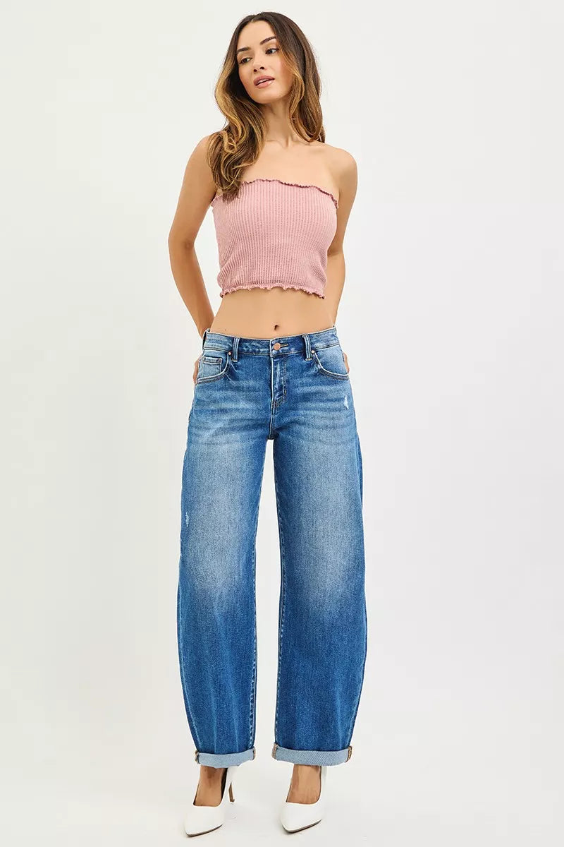 Dark blue RISEN plus size mid-rise barrel jeans with double roll-up cuffs, showing the denim fabric and stylish fit.