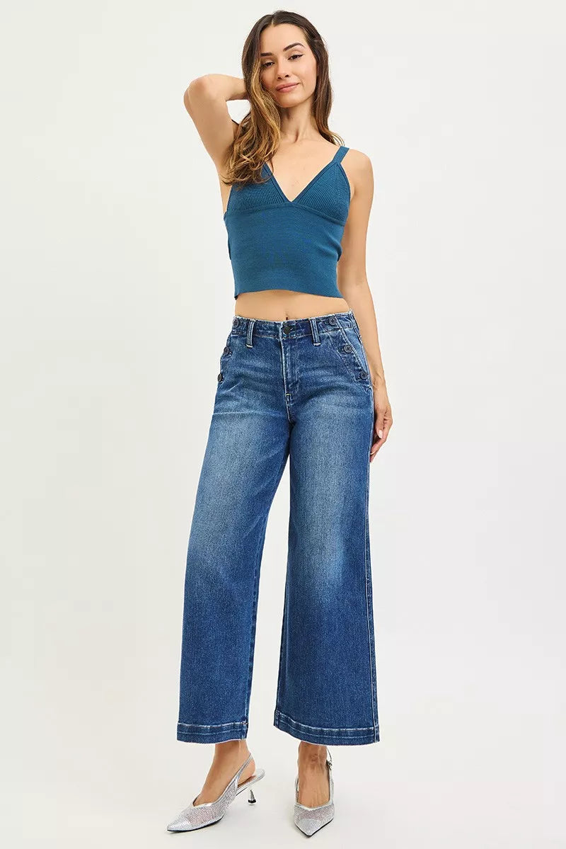 Dark wash Risen high-rise wide-leg jeans by Trendsi with front pockets and button detail, laid flat on a white background.