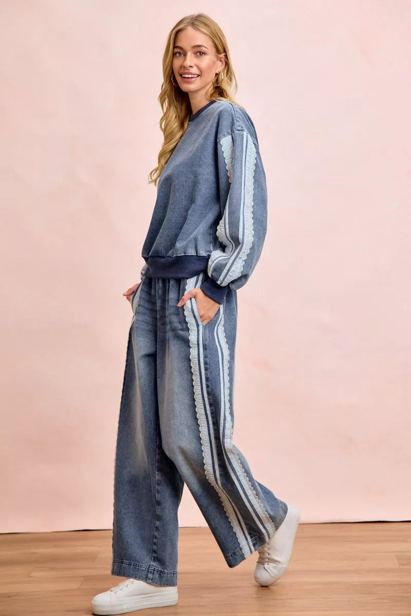 BiBi Washed Lace Contrast Sided Jeans from Trendsi featuring distressed denim with lace detail on the sides.