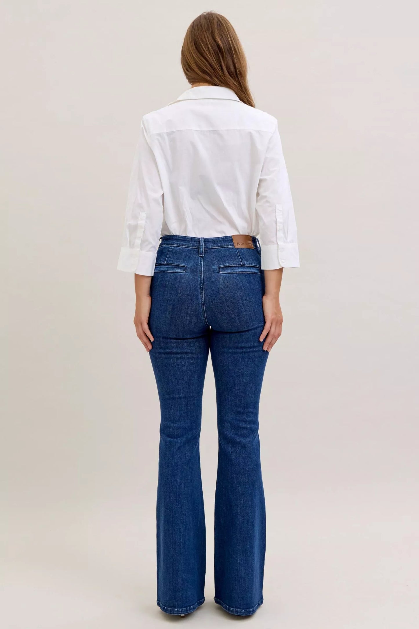 Judy Blue high waist flare jeans with front patch pockets, showcasing classic denim style and trendy fit.