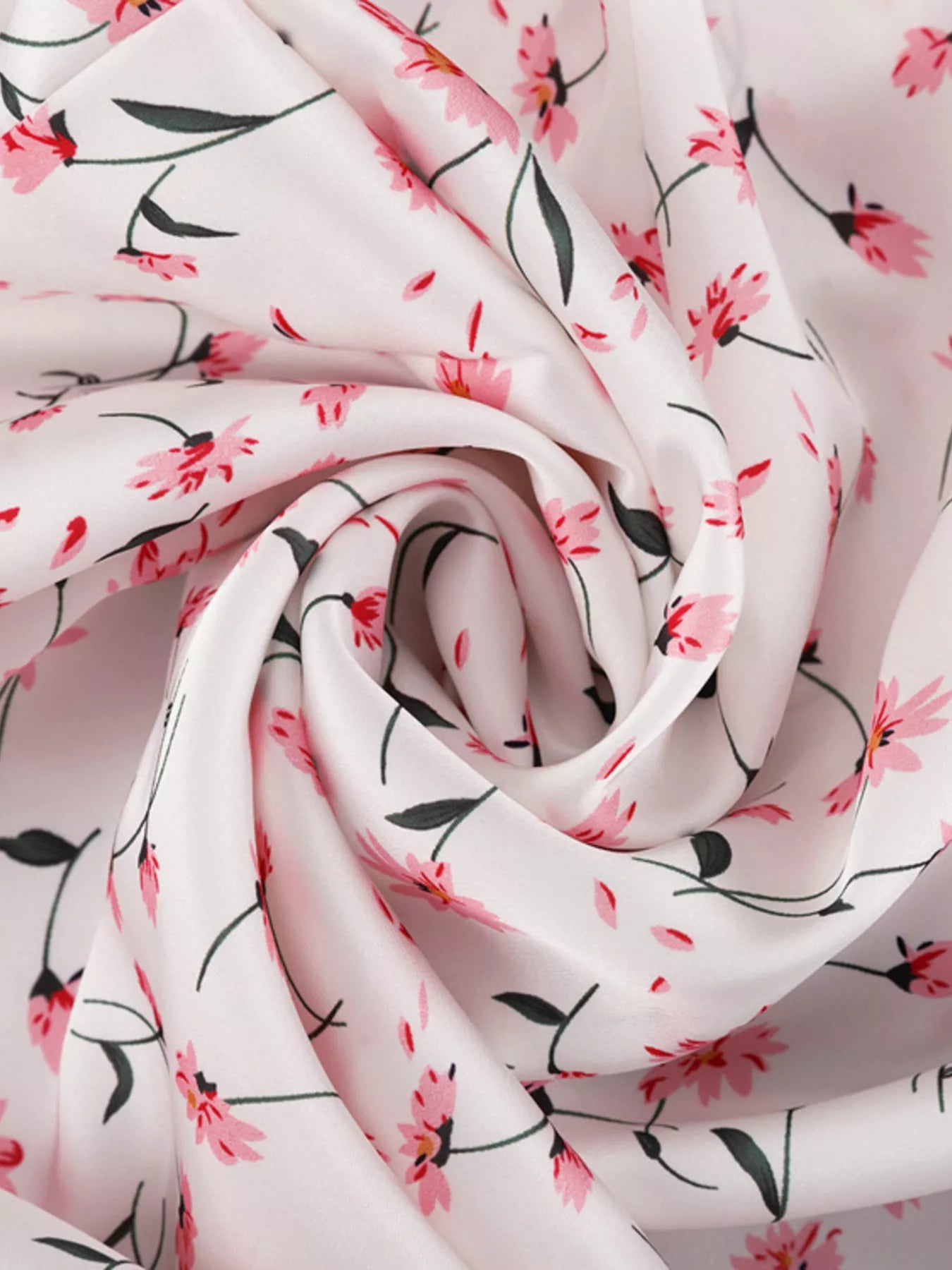 Dusty pink floral print V-neck midi dress with flutter sleeves by Trendsi, featuring a flowy, elegant design perfect for summer.