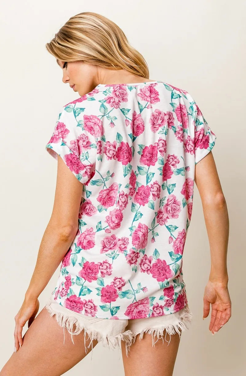 Fuchsia BiBi Rose printed poly span top with crochet lace trim, stylish women's blouse by Trendsi.