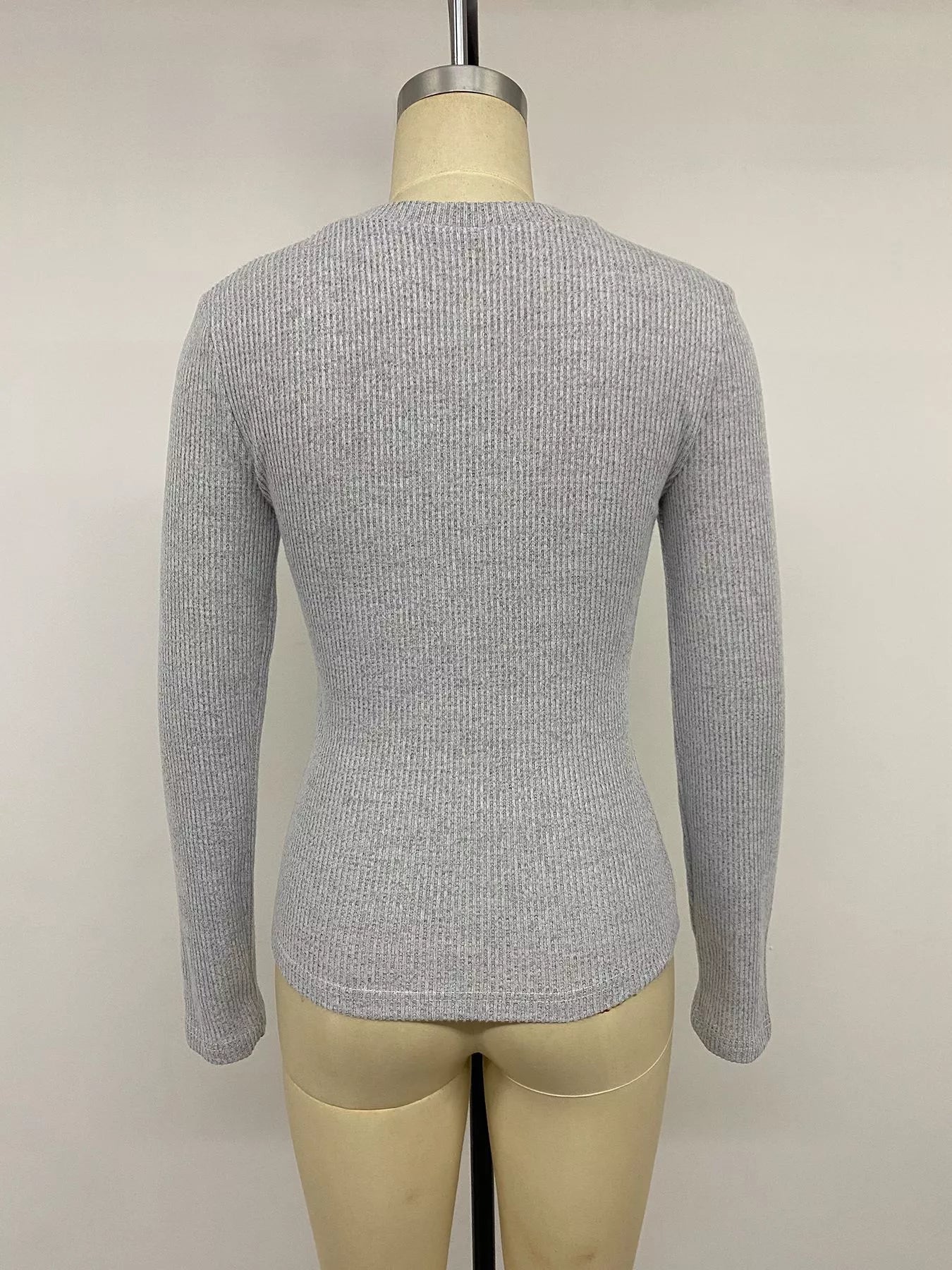 Grey ribbed Henley T-shirt with lace trim from Trendsi, featuring a button neckline and fitted casual style.