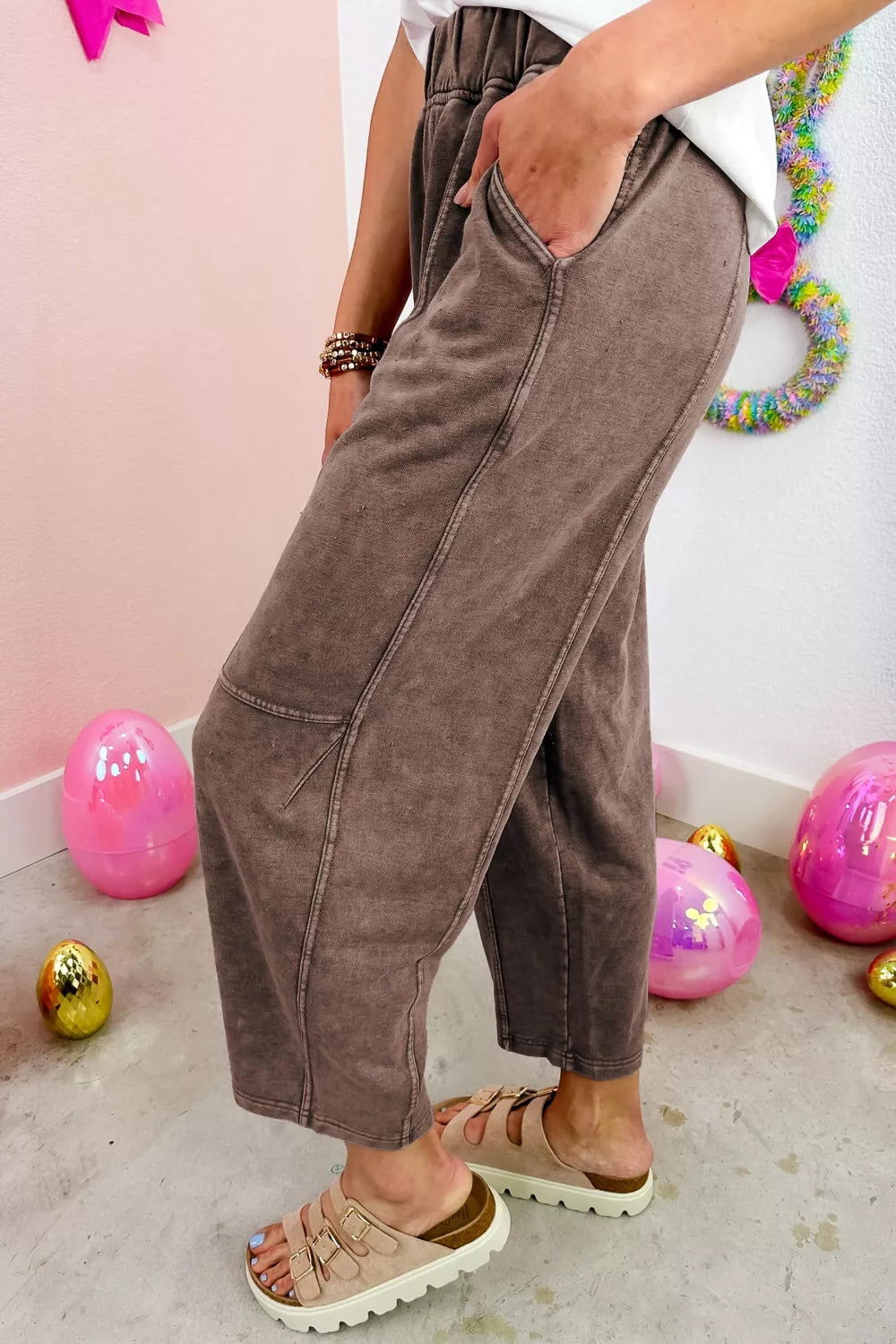 Taupe mineral wash barrel pants with seam details and elastic waist from Trendsi, showcasing a relaxed fit and casual style.