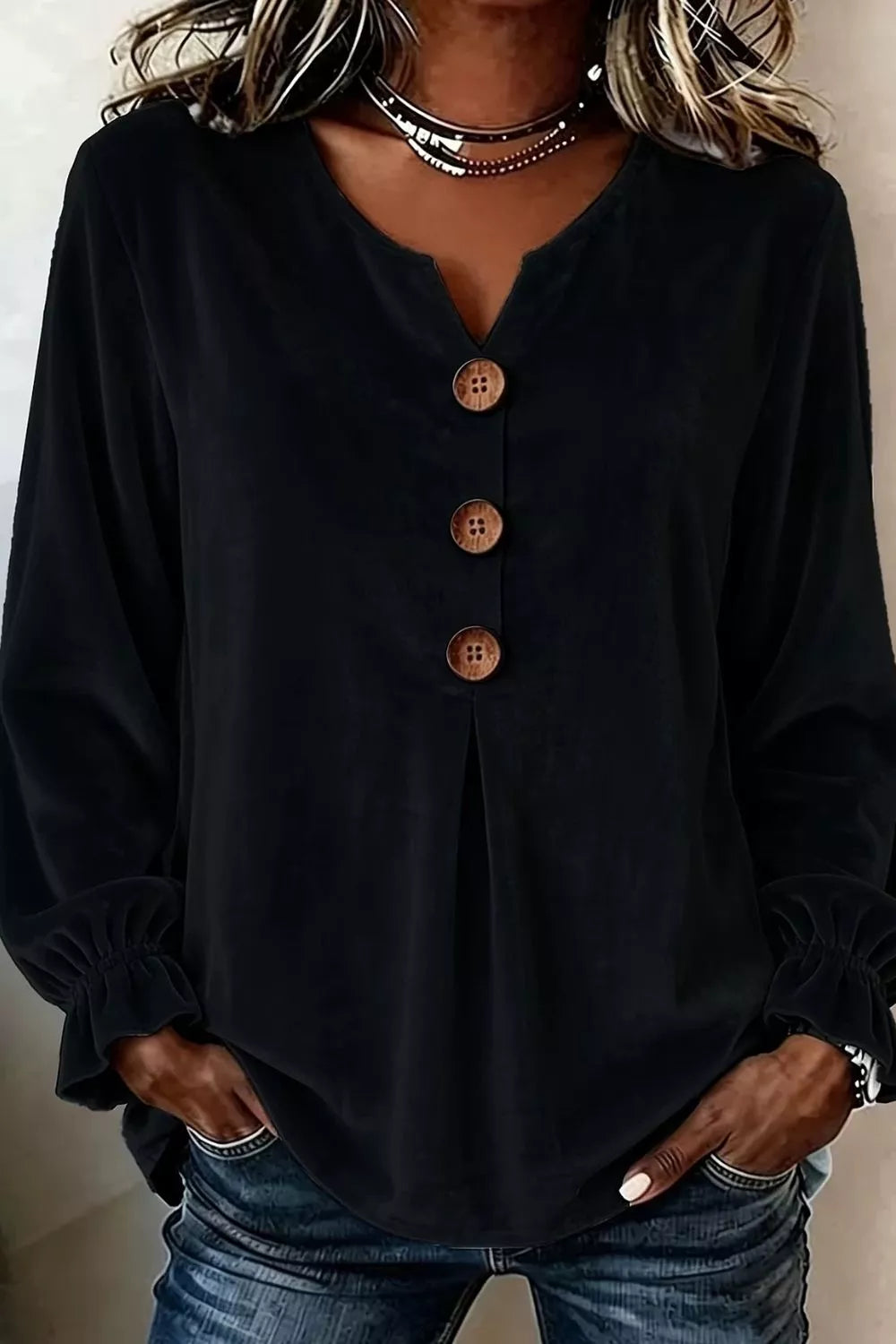 Plus size velvet button decor blouse by Trendsi with ruffled cuffs, full length, featuring luxurious fabric and stylish design.