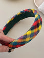 Colorful polyester hair headband with vibrant patterns, perfect for adding a stylish touch to everyday hairstyles.