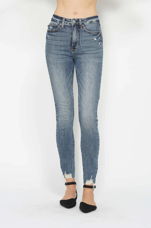 Judy Blue vintage wash skinny jeans with tummy control, distressed hem, and destroy details, perfect for a stylish casual look.