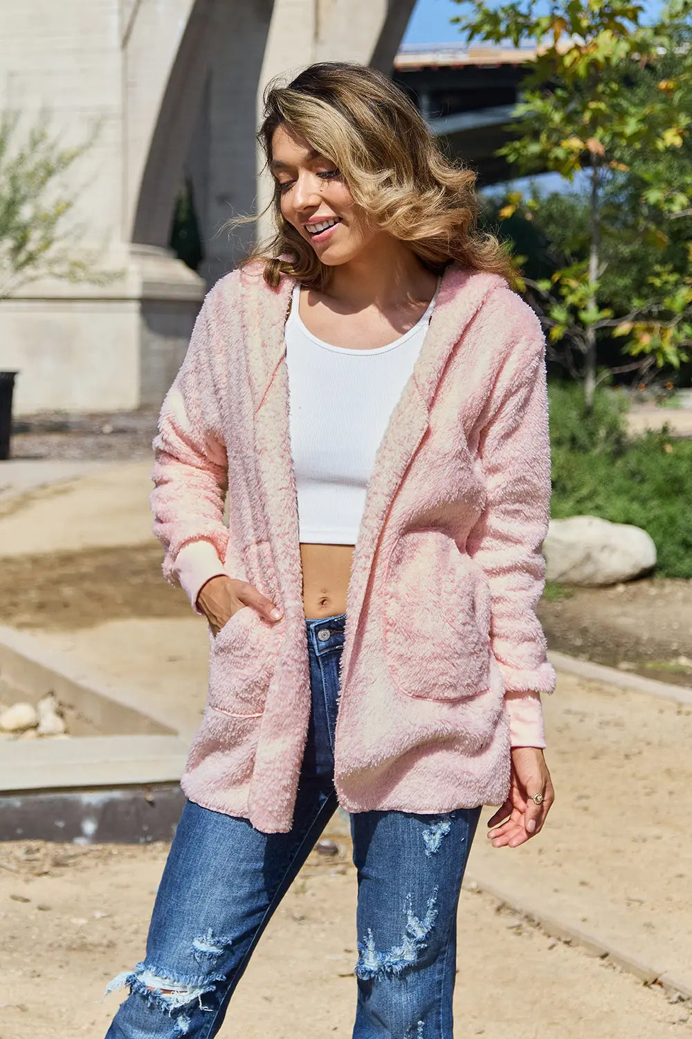 Full size Teddy hoodie jacket with pockets from Trendsi, featuring a soft, plush fabric and a cozy hood for cold weather comfort.
