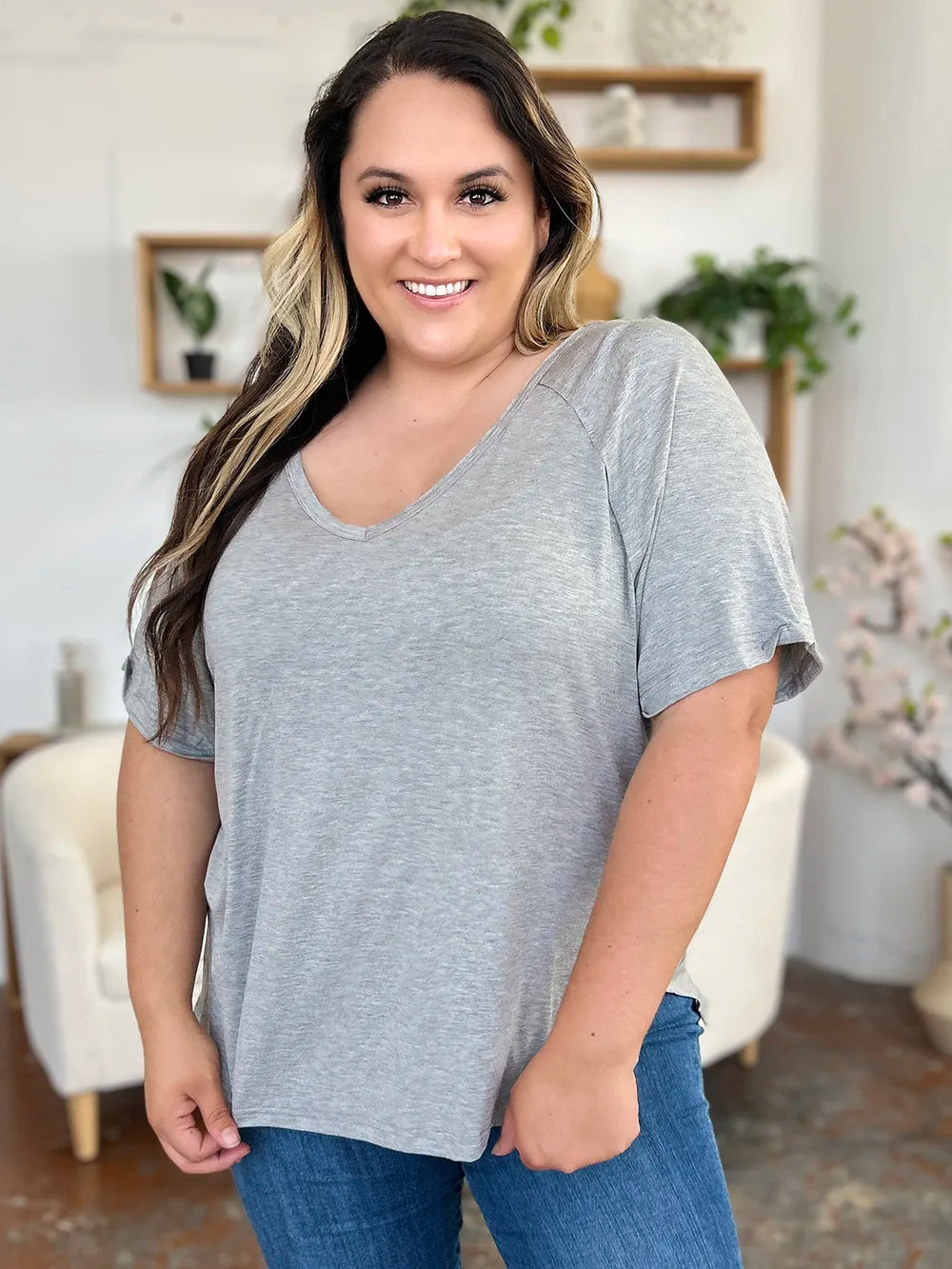 Basic Bae bamboo V-neck T-shirt by Trendsi, full size, short sleeves with a slit detail in soft bamboo fabric.