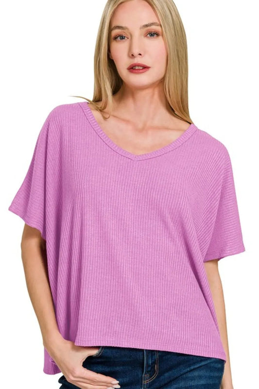 Black Zenana ribbed V-neck short-sleeve knit top with fitted style and textured fabric, perfect for casual or layered outfits.