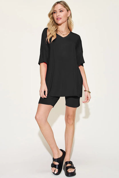Basic Bae bamboo full-size V-neck drop shoulder T-shirt and shorts set by Trendsi, shown in a comfortable casual outfit.