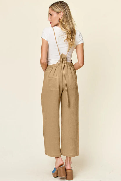 Trendsi Double Take full size texture sleeveless wide-leg overalls, shown in a front view with adjustable straps and wide leg design.