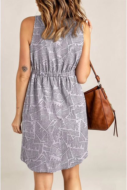 Trendsi double take printed sleeveless casual dress with front buttons, ruched waist, side slit, and pockets, perfect for everyday wear.