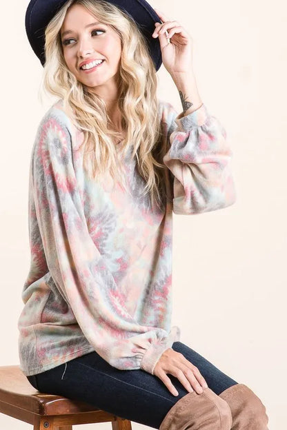 BiBi brushed tie dye print top with puff sleeves, trendy fashion piece, shown in a close-up image highlighting fabric and sleeve details.