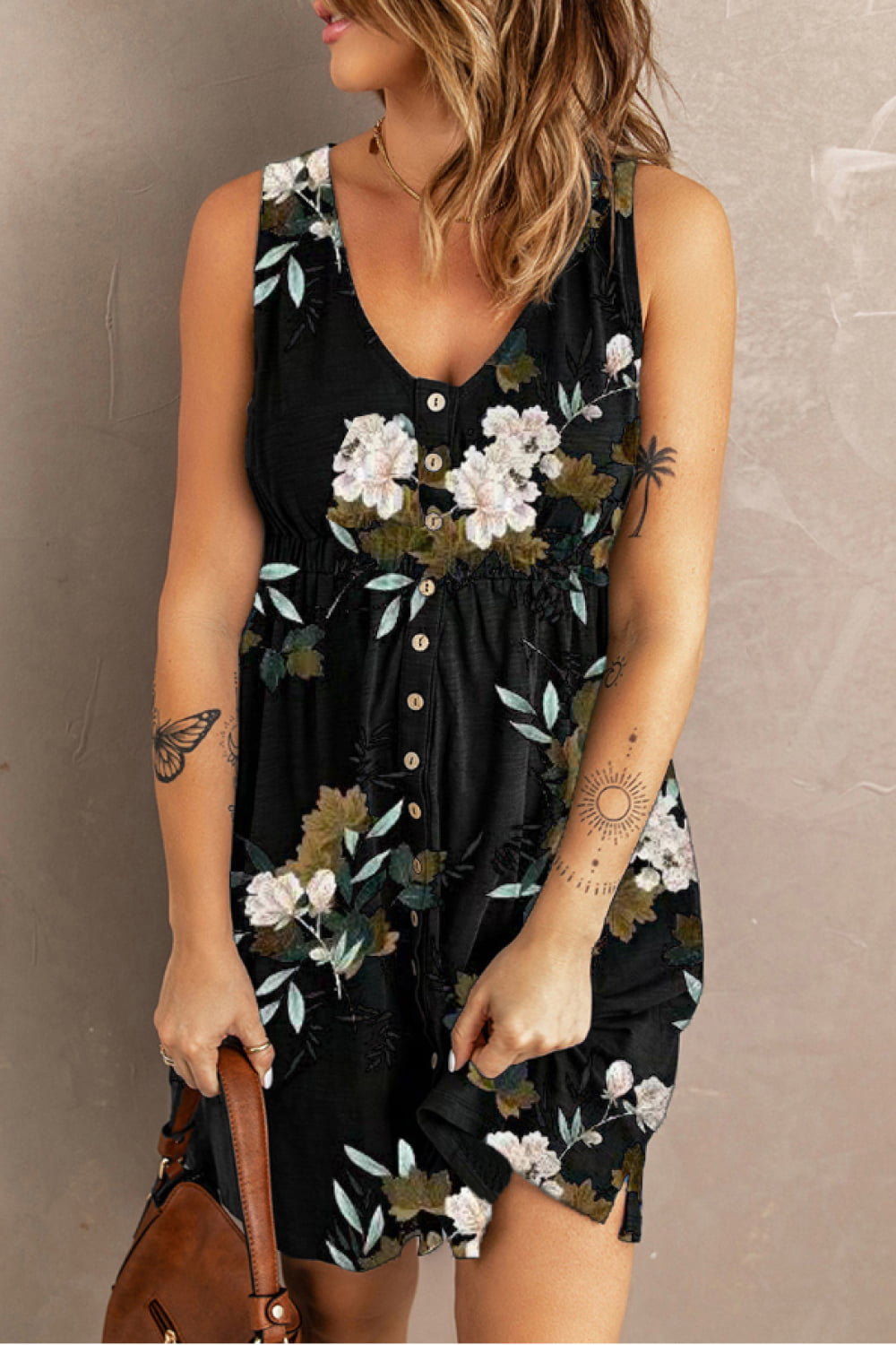Printed sleeveless casual dress by Trendsi featuring front buttons, ruched waist, side slit, and pockets.