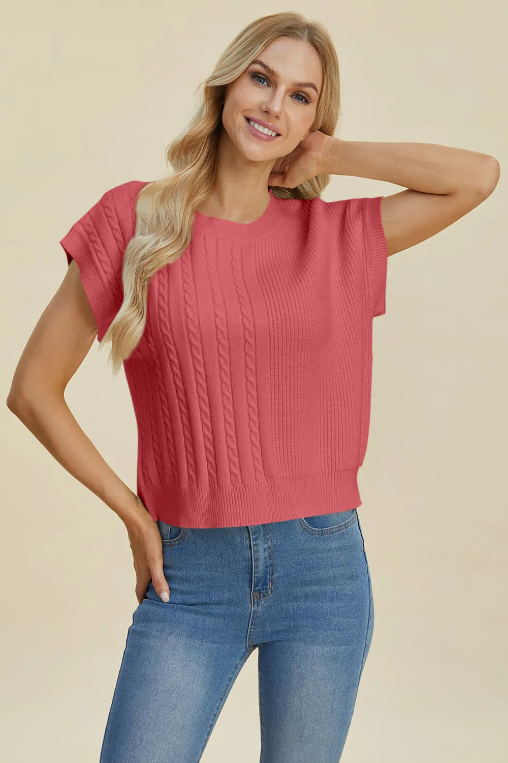 Plus size cable-knit round neck short sleeve sweater by Trendsi, showing a cozy, full-size knit sweater with a classic cable pattern.