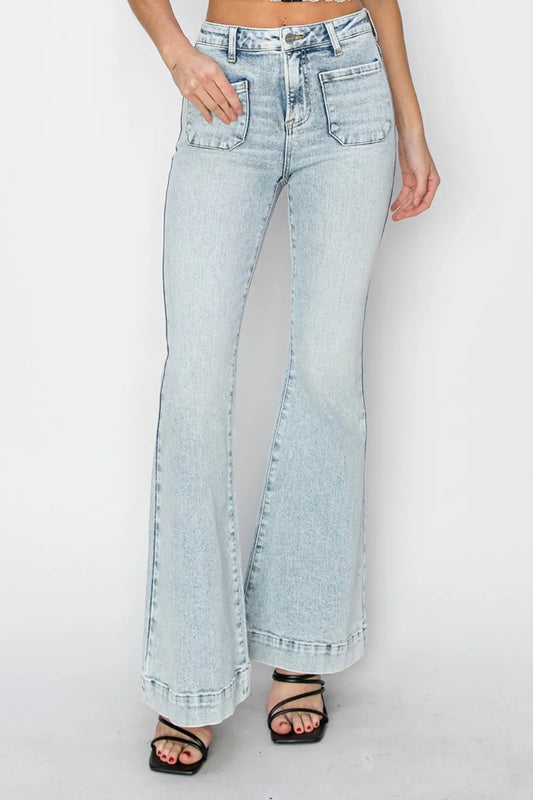 Risen high-rise flare jeans with front patch pockets, full size, trendy denim pants by Trendsi, shown in dark wash.