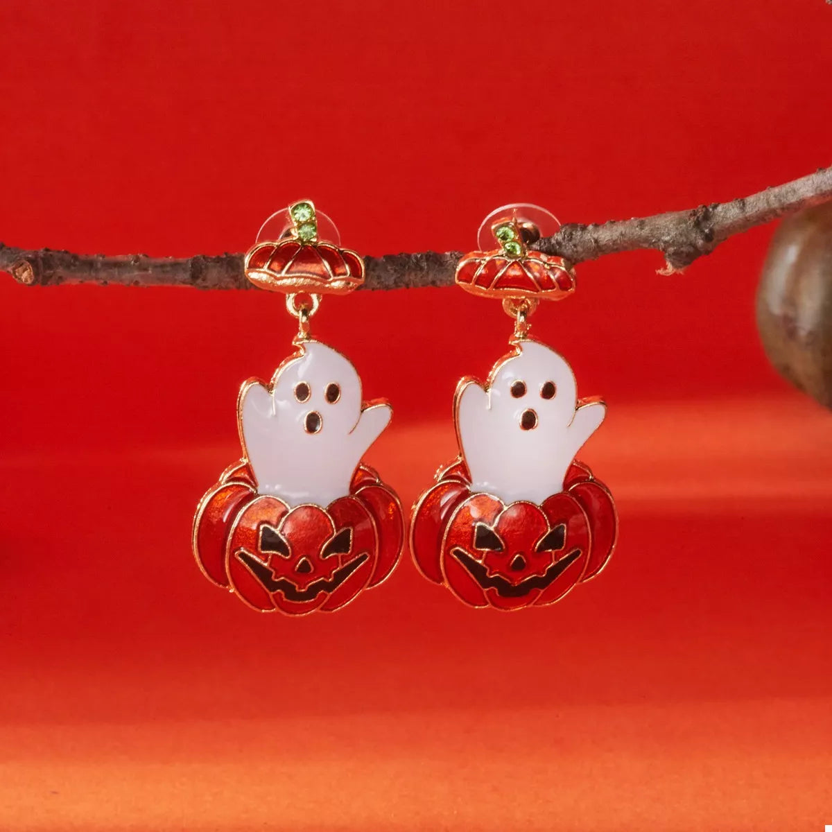 Halloween ghost and pumpkin dangle earrings with spooky charm, featuring black and orange accents, perfect for fall accessories.