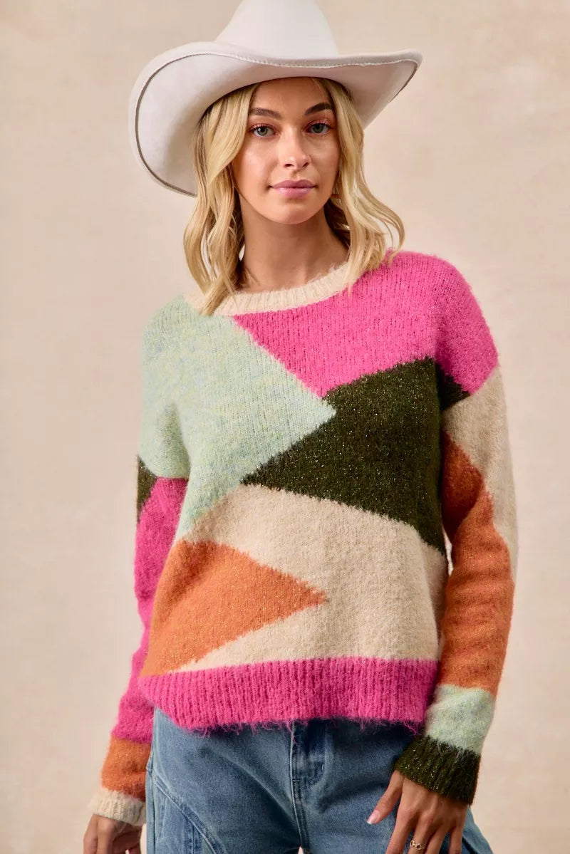 Multi-color block sweater top from BiBi by Trendsi, featuring a cozy knit fabric and vibrant color blocks.