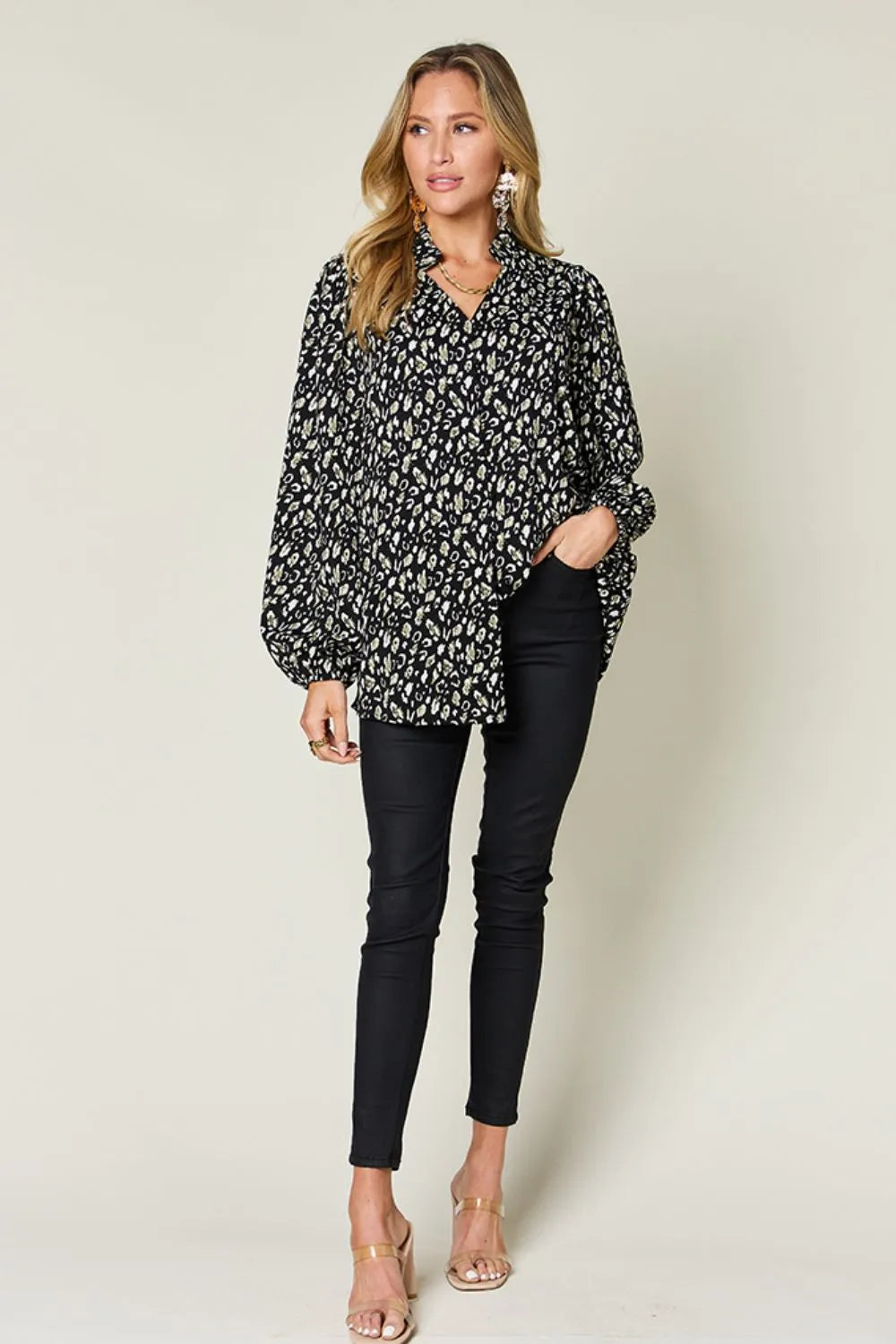 Plus size leopard print long sleeve blouse by Trendsi, featuring a stylish double take design and full size fit.