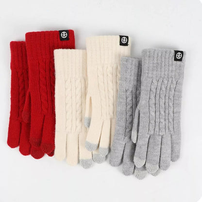 Trendsi cable knit touchscreen gloves in cozy knit with finger tips designed for easy device use in cold weather.