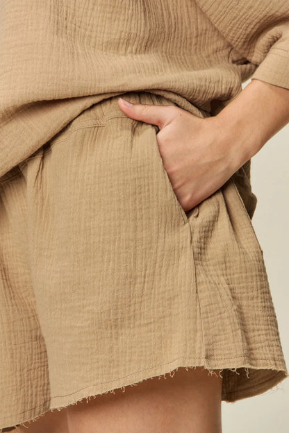 Trendsi Double Take Texture half sleeve T-shirt and matching drawstring shorts set, casual loungewear with textured fabric.