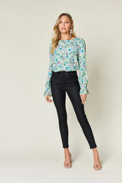 Printed flounce sleeve blouse from Trendsi with a stylish full size design and eye-catching pattern, perfect for casual or dressy wear.