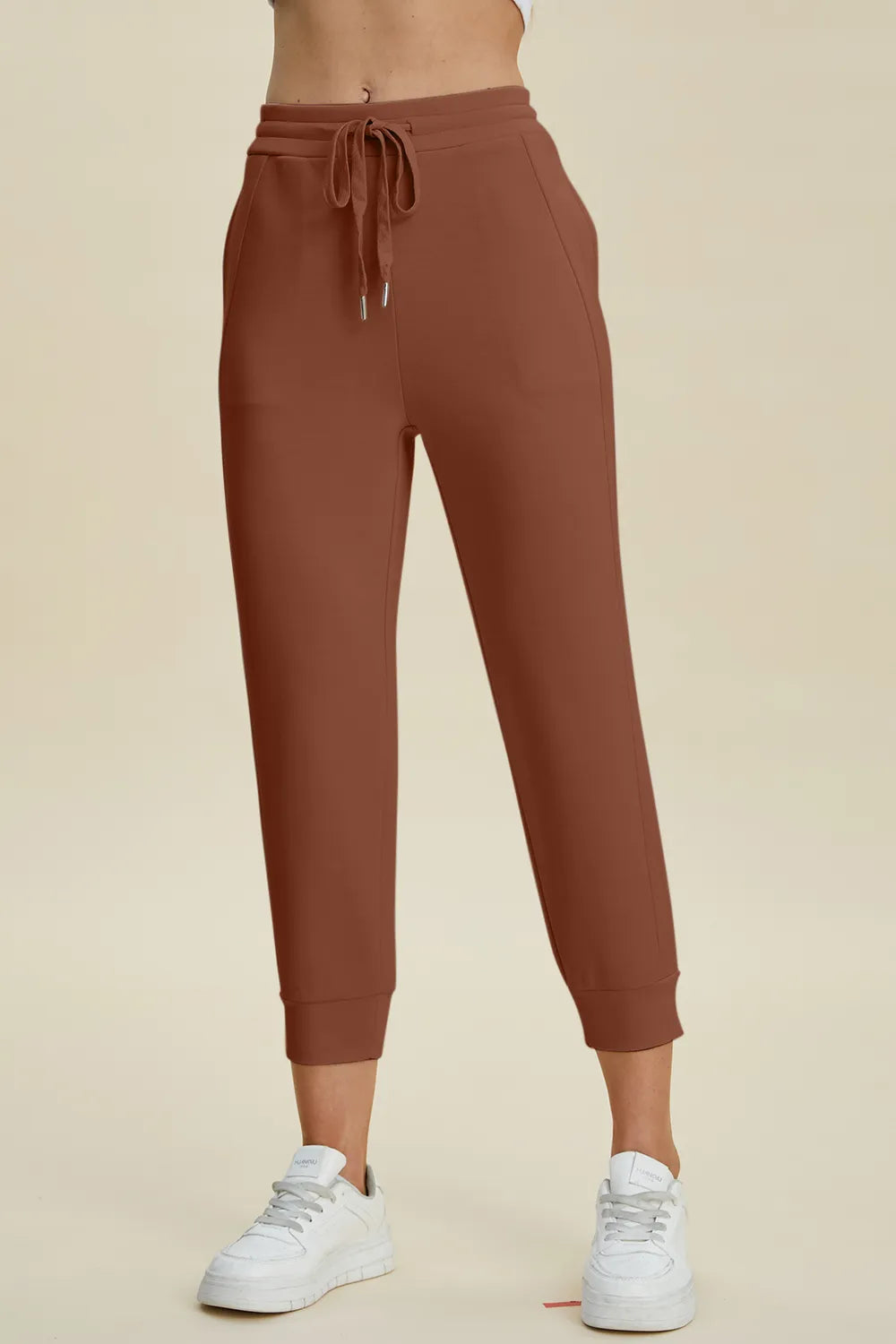 Trendsi Basic Bae full-size air scuba drawstring high-waist cropped pants in black, featuring a comfortable fit and stylish design.