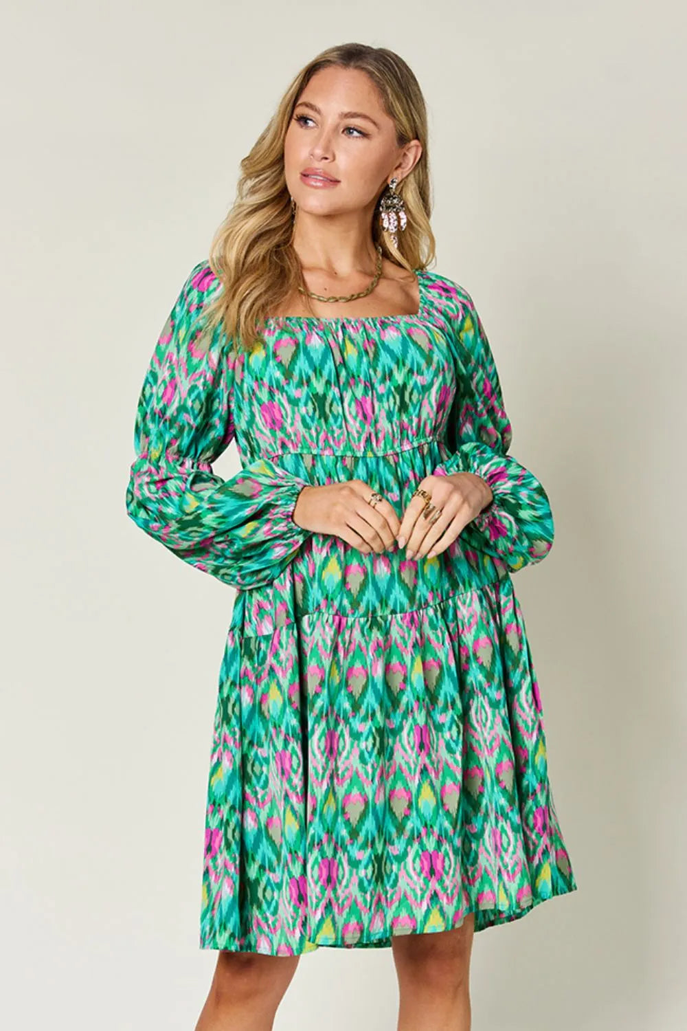 Printed long sleeve dress from Trendsi's Double Take collection, full size, showcasing a stylish pattern and comfortable fit.