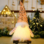 Sequin light-up faceless gnome figurine with a whimsical design, featuring shiny sequins and LED lighting, by Trendsi.