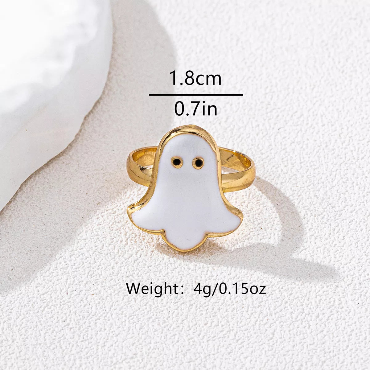 Halloween ghost gold-plated ring featuring a cute ghost design, 18K gold plating, from Trendsi, displayed on a neutral background.