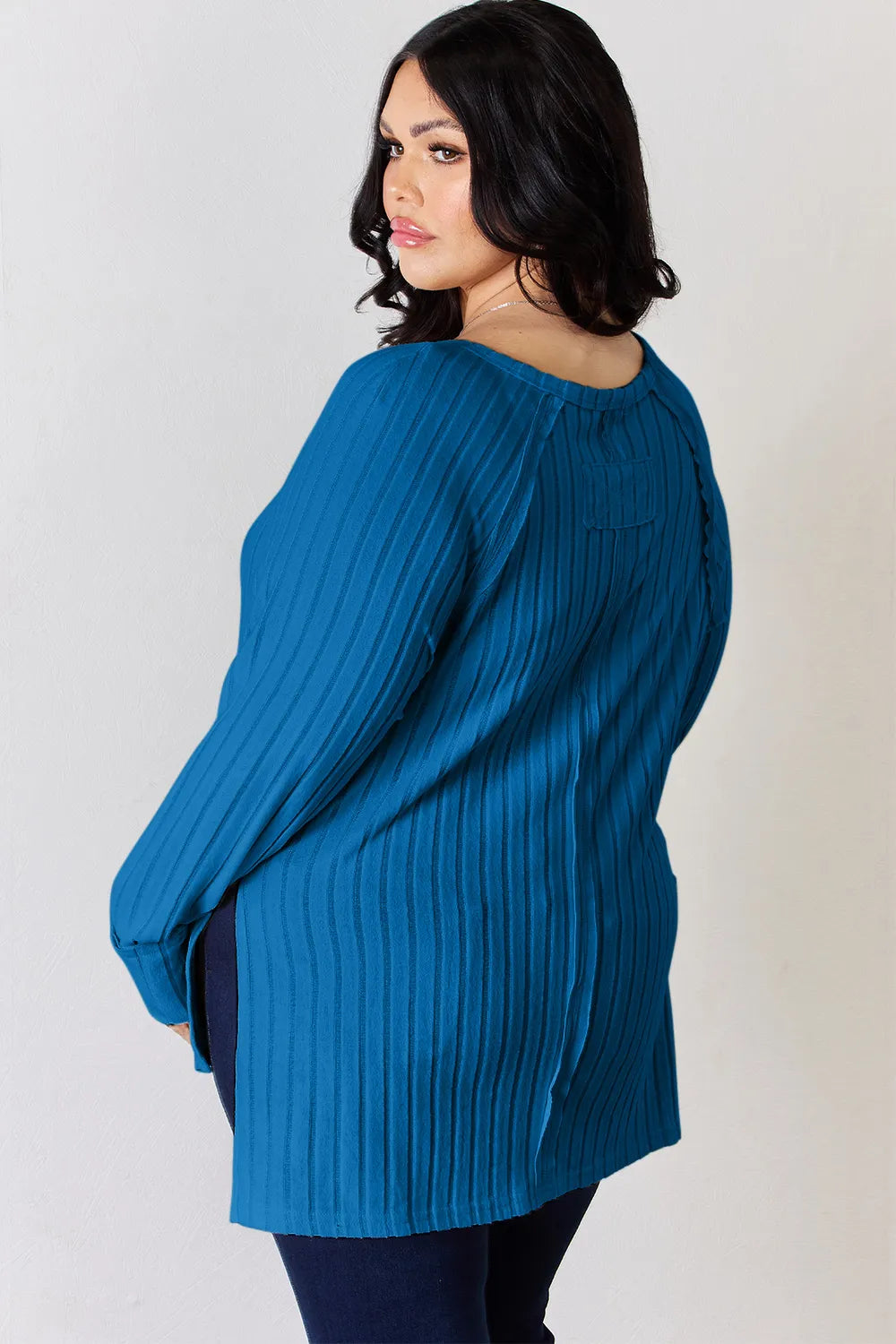 Full size ribbed round neck slit T-shirt by Trendsi, featuring a basic design with a comfortable fit and ribbed fabric.