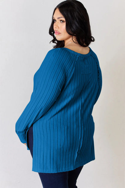 Full size ribbed round neck slit T-shirt by Trendsi, featuring a basic design with a comfortable fit and ribbed fabric.