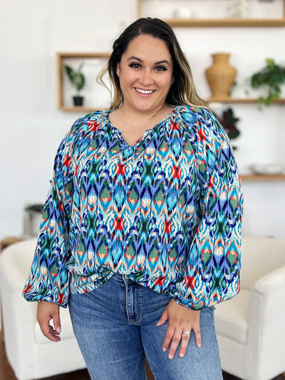Printed balloon sleeve blouse from Trendsi featuring a double take full size design with stylish balloon sleeves.