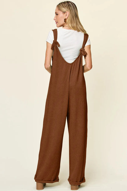 Trendsi Double Take full size textured sleeveless wide leg jumpsuit displayed on a mannequin.