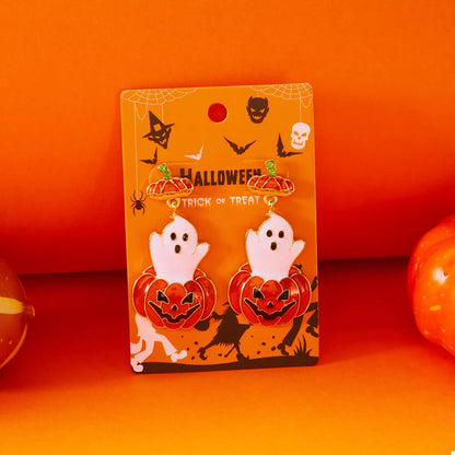 Halloween ghost and pumpkin dangle earrings from Trendsi featuring spooky ghost and pumpkin charms on silver hooks.