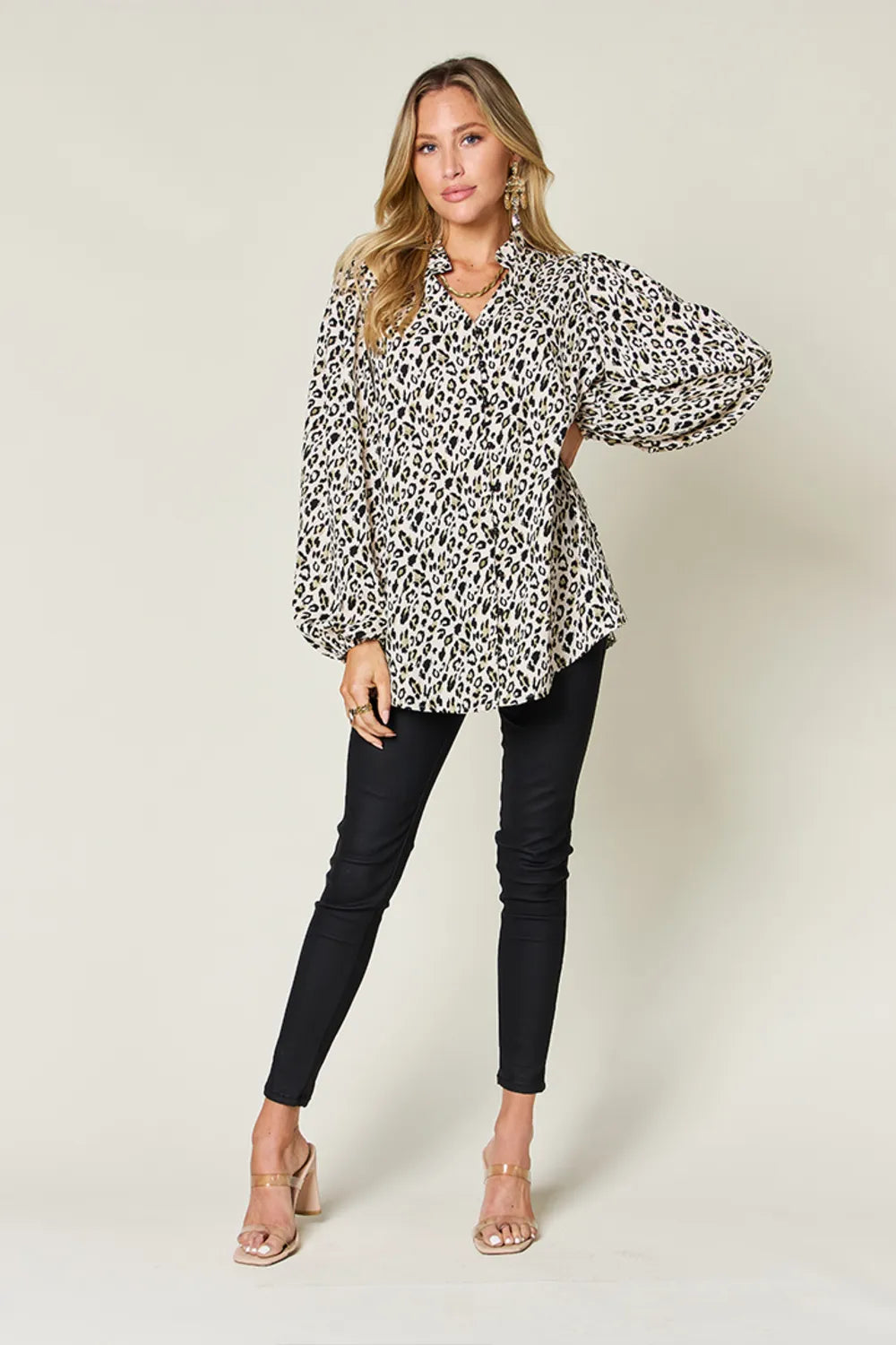 Plus size leopard print long sleeve blouse by Trendsi, featuring a stylish double take full size design with a flattering fit.