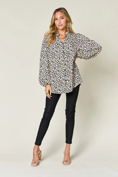 Plus size leopard print long sleeve blouse by Trendsi, featuring a stylish double take full size design with a flattering fit.