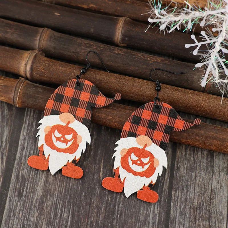 Wooden Dwarfs Pumpkin Dangle Earrings featuring carved dwarf and pumpkin design, handmade jewelry by Trendsi.