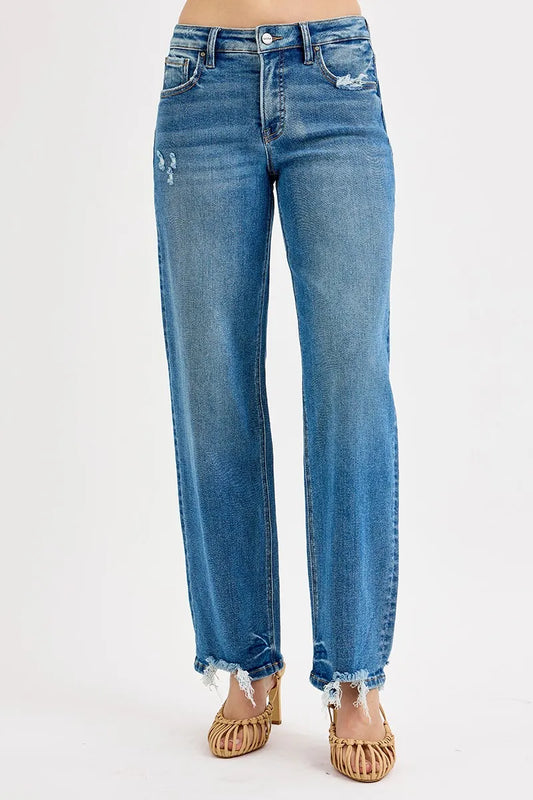 Plus size RISEN full size mid-rise baggy jeans by Trendsi, showing relaxed fit and denim fabric in a natural pose.