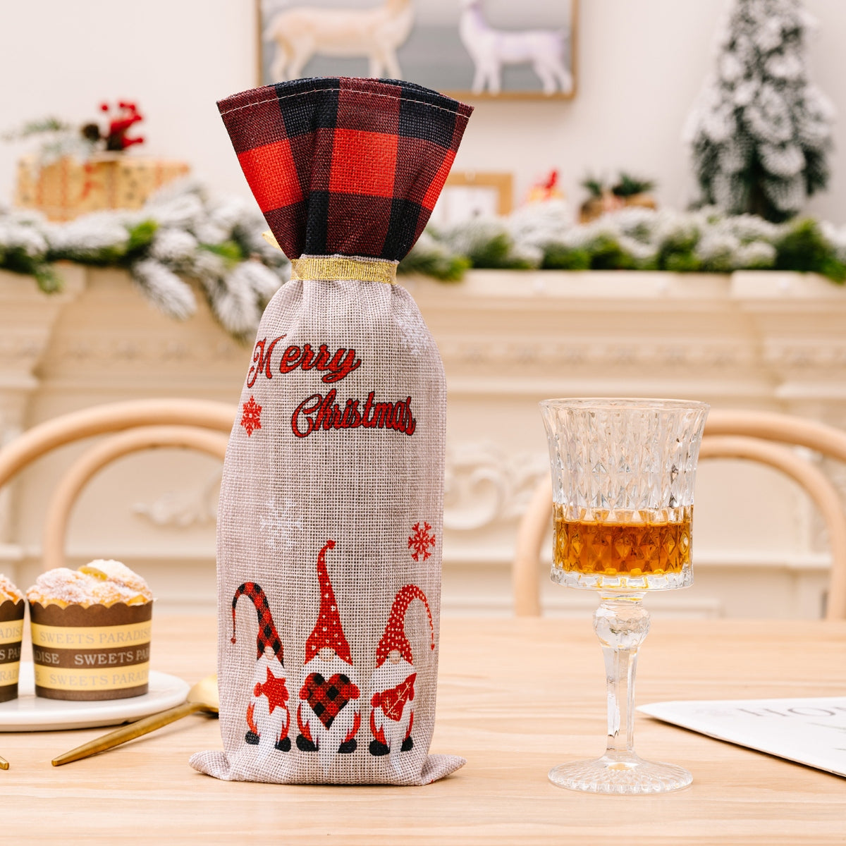 Two Christmas plaid wine bottle covers with festive red and green patterns, designed to decorate wine bottles during the holiday season.