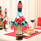 Christmas hat and scarf wine bottle decoration from Trendsi, festive holiday accessory for wine bottles, warm and colorful.